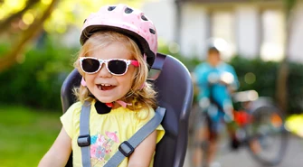 Odkryj tajemnicę bezpiecznych podróży z dzieckiem na rowerze. Odpowiedni fotelik to klucz!